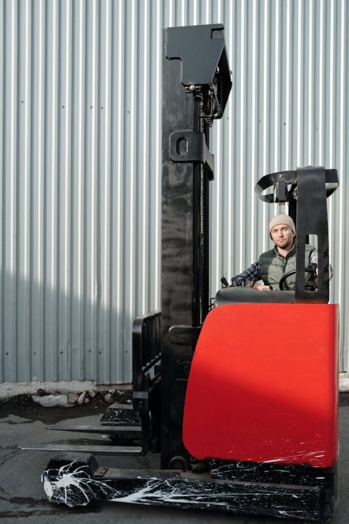 operator sitting inside forklift