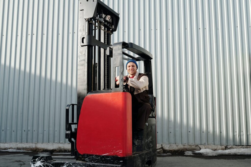 man operating forklift